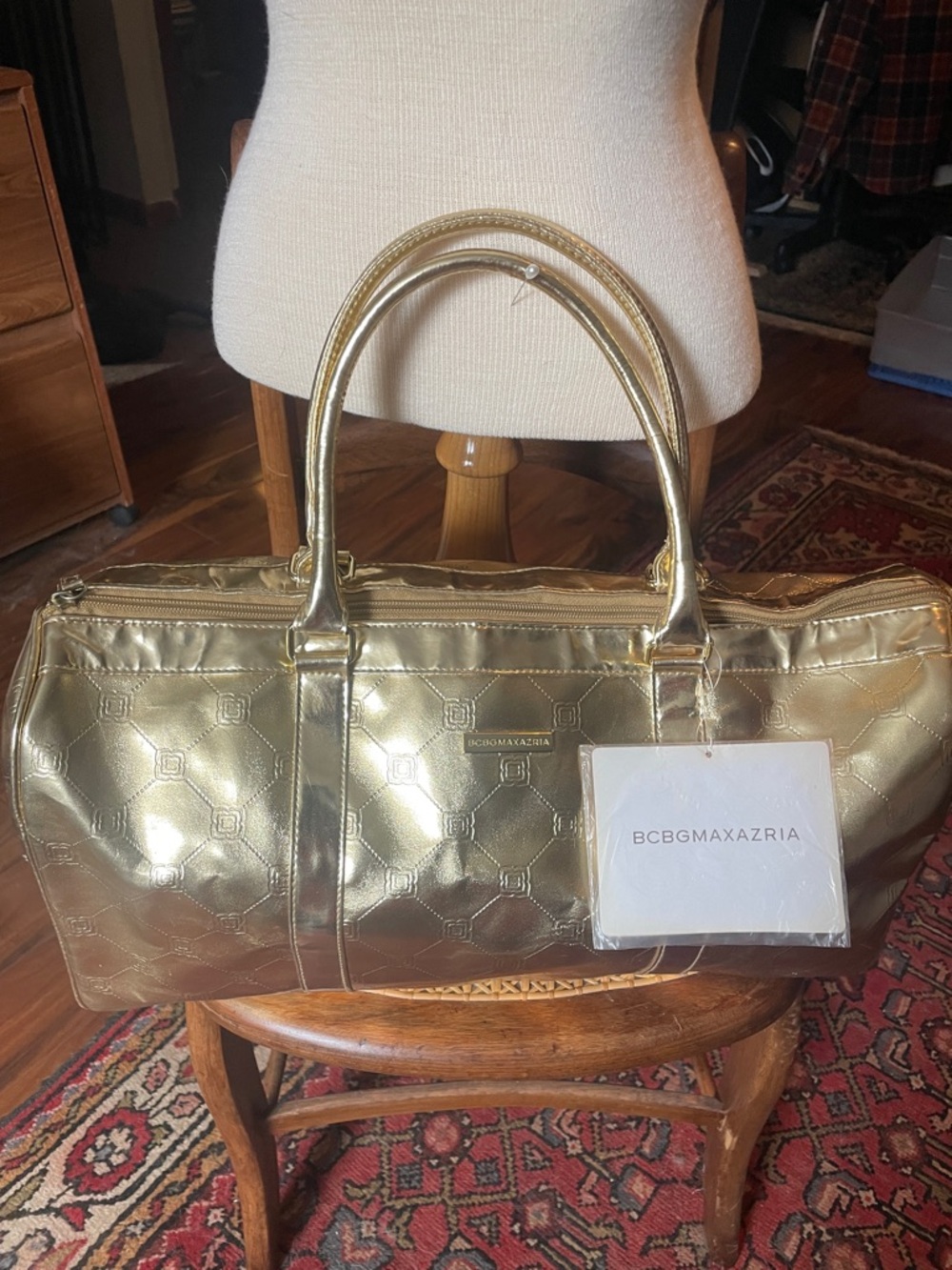BCBGMaxAzria Metallic Gold Travel Duffle